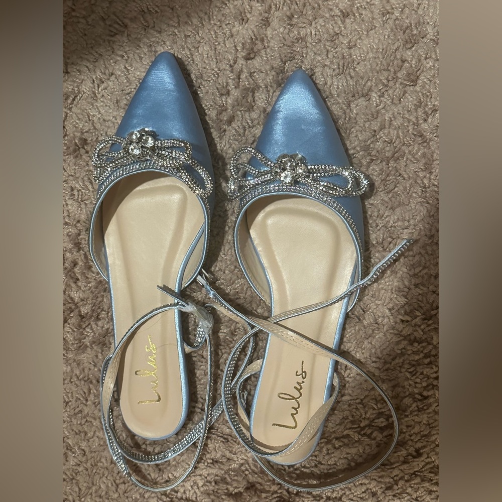 Lulu’s light blue satin and crystal flats with wrap around strap. Sz 9